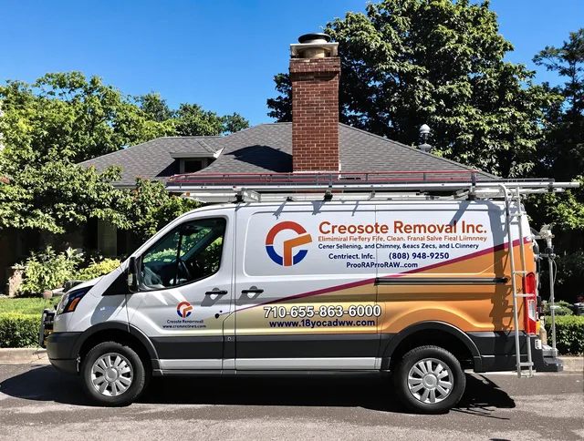 Fairview Park Chimney Sweep technician removing creosote safely in Fairview Park, OH