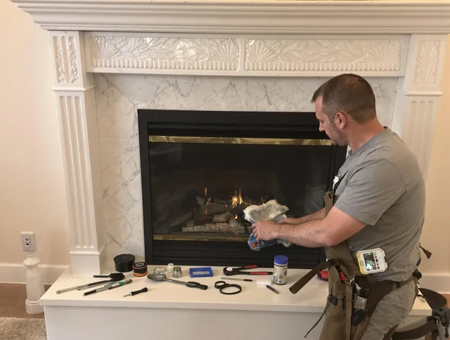 Fairview Park Chimney Sweep performing fireplace maintenance in Fairview Park, OH
